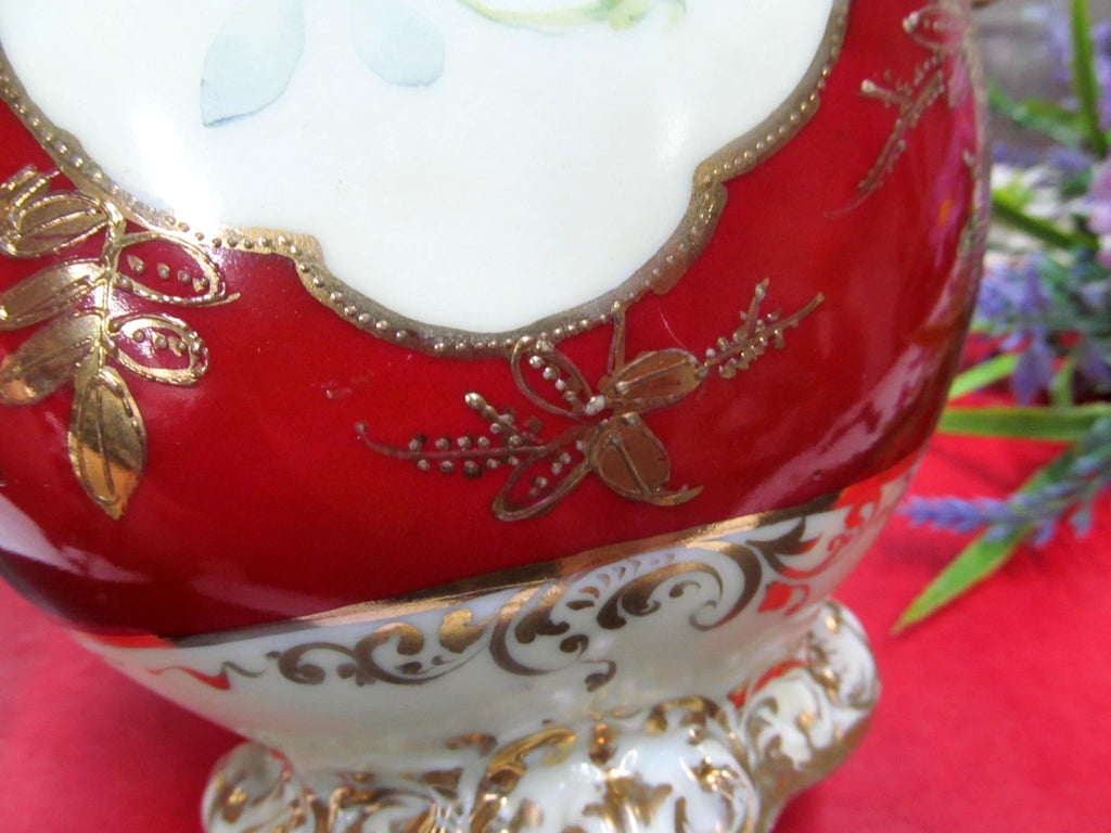 Nippon hand painted with roses and thick raised beaded gold gilt work Urn