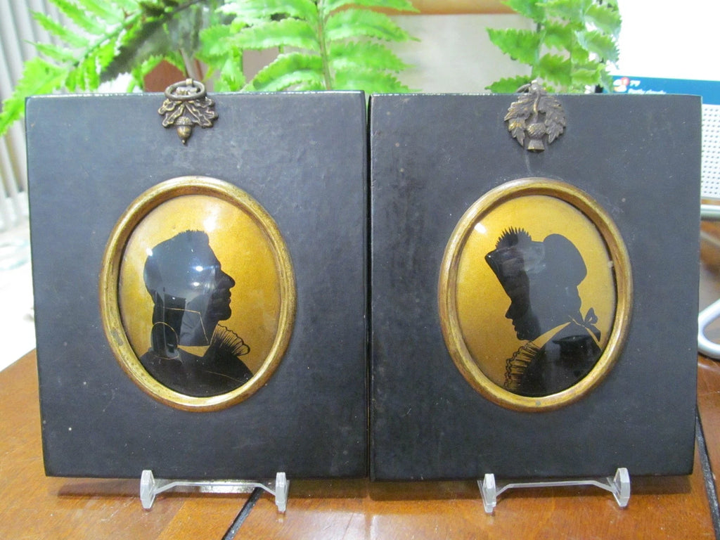 Antique Pair Of Regency Silhouettes painted with convex glass wood frames
