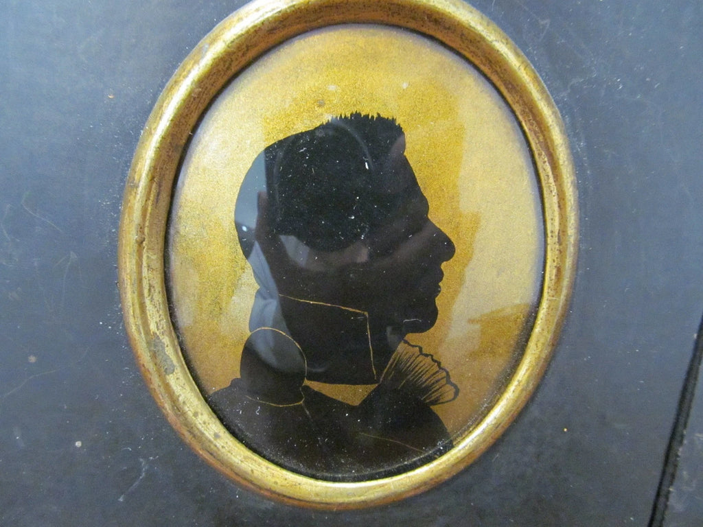Antique Pair Of Regency Silhouettes painted with convex glass wood frames