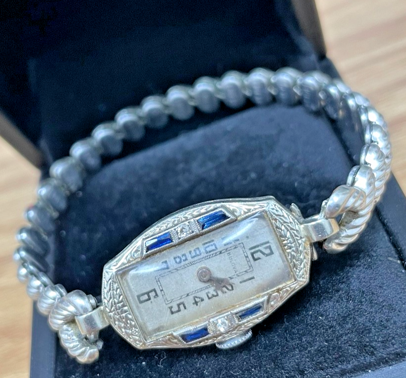 Bulova Art Deco watch dial close-up with sapphire and diamond accents